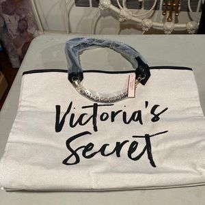 A beautiful brand new Victoria Secret Beach bag with tag in off white.